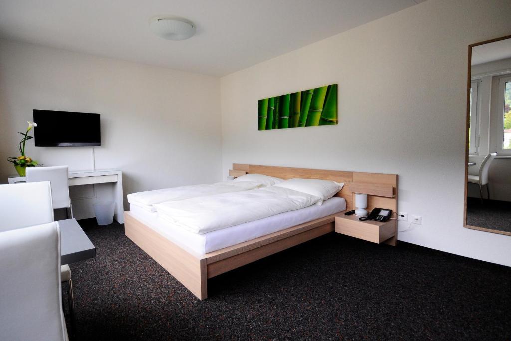 Hotel Oasis Moutier Værelse billede